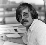 Man with Mustache Sitting at Desk, A by George Skip Gandy IV