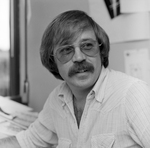 Man with Mustache Sitting at Desk, C by George Skip Gandy IV