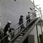 Models Going up Stairs During Fashion Shoot, Florida Steel, A by George Skip Gandy IV