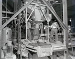 Employees Fill Bags with Material, Fillette Green by George Skip Gandy IV