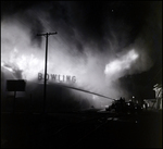 Fire Fighters Battle Blaze at Davis Islands Coliseum in Tampa, Florida, C by Skip Gandy