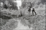 Jerry Bowmer and Developers Evaluate Irrigation Ditch on Site in Tampa, Florida, H by Skip Gandy