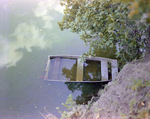 Abandoned Rowboat Partially Submerged, Florida, A