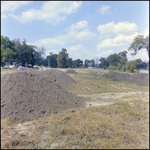 Several Mounds of Top Soil and in the Distance New Residential Construction, Tampa, Florida, A by George Skip Gandy IV