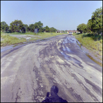 A Muddy Street Leads through a Planned Subdivision, Tampa, Florida, I by George Skip Gandy IV