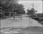 Street Barricaded with a Portion of the Road Damaged, Tampa, Florida, A by George Skip Gandy IV