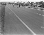 Toll Road with Men Walking on Road, Tampa, Florida, A by George Skip Gandy IV