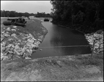 A River Segment with Riprap on both Sides of the Banks, Tampa, Florida, A by George Skip Gandy IV