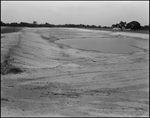 An Excavated Site with a Large Pool of Water in its Center, Tampa, Florida, B by George Skip Gandy IV