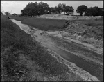 River Flowing from a Culvert through River Bed, Tampa, Florida by George Skip Gandy IV