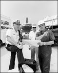 Coast Guard Officer and Tech from Chevron Examine Maps and Plan Response, Tampa, Florida, F by George Skip Gandy IV