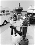 Coast Guard Officer and Tech from Chevron Examine Maps and Plan Response, Tampa, Florida, H by George Skip Gandy IV