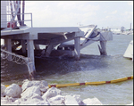 A Damaged Pier is Crushed and Buckled with Debris Falling into the Water, Tampa, Florida by George Skip Gandy IV