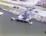 Aerial View of a Damaged Pier or Dock with Vehicles Parked Nearby, Tampa, Florida by George Skip Gandy IV