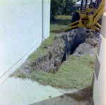 Excavating Trench Near House by George Skip Gandy IV