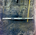 Level and Yardstick in Trench, D by George Skip Gandy IV