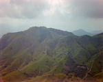 Aerial View of Mountainous Landscape with Dirt Roads by George Skip Gandy IV