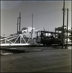 Frisco Railroad automobile carrier offloading, Pensacola, Florida, F