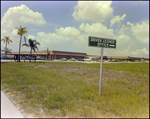 Bay Plaza Entrance and Sign, Drivers License Sign, Tampa, Florida, A by Skip Gandy