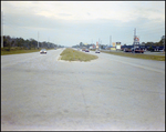 Cars Driving on a Road, L