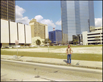 Parallel Parked Cars Around Empty Lot, B