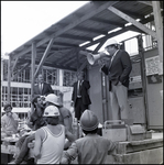 Man speaking to construction worker, A