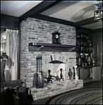 Brick Hearth with Built-In Trophy Shelves in Tampa, Florida, B by Skip Gandy