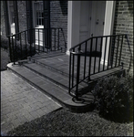 Brick Steps to Home Entryway with Wrought-Iron Handrails in Tampa, Florida, A by Skip Gandy