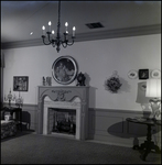 Fireplace with Portrait of Two Children Overhead in Home in Tampa, Florida, B by Skip Gandy