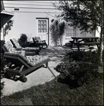 Patio with Outdoor Lounge Chairs and Picnic Table in Tampa, Florida, B by Skip Gandy