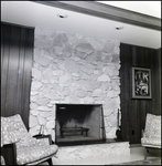 Fireplace with Stone Hearth Sits in Wood-Paneled Room in Tampa, Florida, B by Skip Gandy