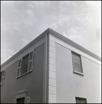 Corner of Two-Story Home with Window Shutters and White Gutters in Tampa, Florida, B by Skip Gandy