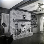 Brick Hearth with Built-In Trophy Shelves in Tampa, Florida, D by Skip Gandy