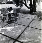 Patio of Concrete Pavers with Wrought-Iron Table Set in Tampa, Florida, B by Skip Gandy