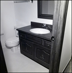 Bathroom Vanity with Large Rectangular Mirror in Tampa, Florida, A by Skip Gandy