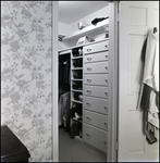 Walk-in Closet with Clothing and Shoe Storage in Tampa, Florida, A by Skip Gandy