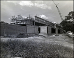 Building Undergoes Construction with On-Site Crane in Tampa, Florida, C by Skip Gandy