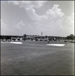 Golfers Play Outside Buckhorn Springs Golf and Country Club in Valrico, Florida, B by Skip Gandy