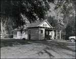 Wood-Paneled Home with Screened Porch in Tampa, Florida, B by Skip Gandy