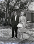 Couple Poses in Front of Model Home in Briarwood Neighborhood, Tampa, Florida, B by Skip Gandy