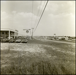 Car Lots and Gas Station Near Two-Lane Expressway, Tampa, Florida by George Skip Gandy IV