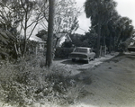 Automobile Parked in Front of Fence, Tampa, Florida by George Skip Gandy IV