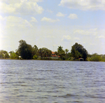 Waterfront Property and Boathouse by George Skip Gandy IV