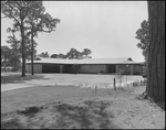 View of a House with Circular Driveway by George Skip Gandy IV