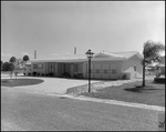 House with Gravel Driveway and Front Lamp Post by George Skip Gandy IV