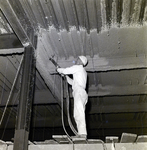 Construction Worker Spraying Insulation on Beams for Courthouse Annex, Tampa, Florida, B by George Skip Gandy IV