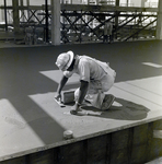 Construction Worker Smoothing Concrete for Courthouse Annex, Tampa, Florida, A by George Skip Gandy IV