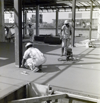 Construction Worker Smoothing Concrete for Courthouse Annex, Tampa, Florida, B by George Skip Gandy IV