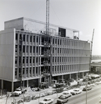 Crane Handling a Panel, with the Construction Company Sign, Hillsborough County Courthouse, Tampa, Florida by George Skip Gandy IV