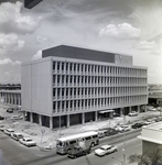 Workers Paint South Side of the County Courthouse Annex, B by George Skip Gandy IV